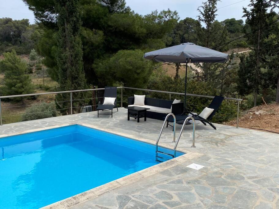 Retreat Villa By The Sea With Pool In 포르토헬리 외부 사진
